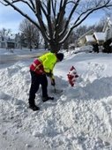 photo of shoveling around fire hydrant