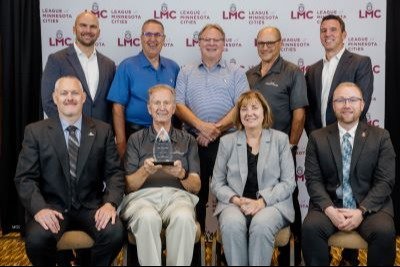 Photo of City officials receiving LMC award