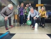 stock image seniors bowling