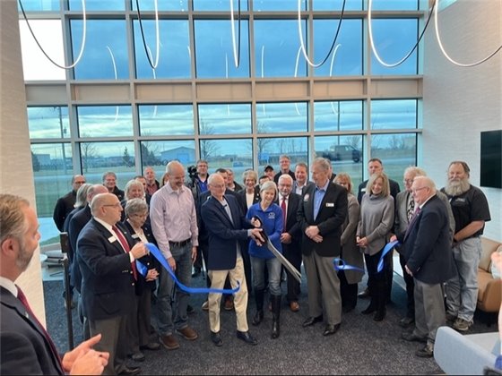 Photo of ribbon cutting at Climate by Design International building