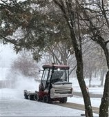 photo of sidewalk snow clearing