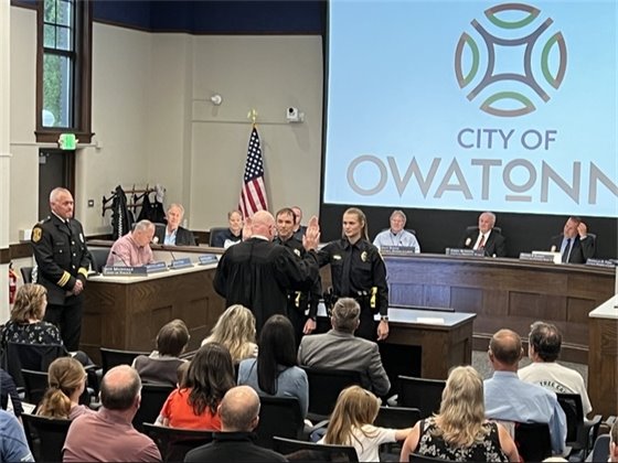 photos of officers Helget and Hansen being sworn in