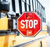 stock photo of school bus with stop arm extended