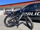 Photo of bike patrol bike and squad car